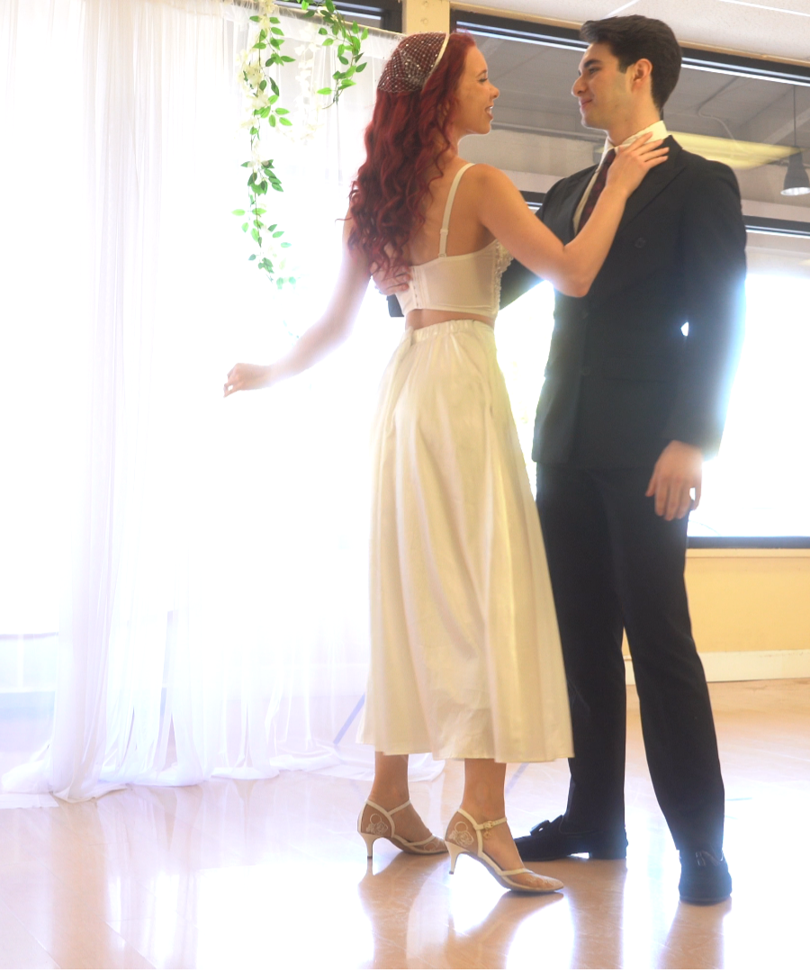 Ivory LunaSol Lace Ballroom heels under a wedding dress on a ballroom floor